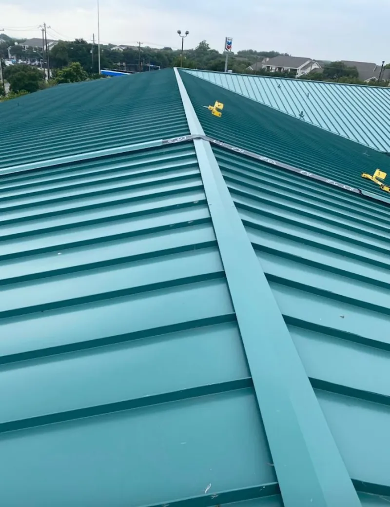 Green commercial metal roof ridge and valley for Metal Roof Repair in Stansbury Park
